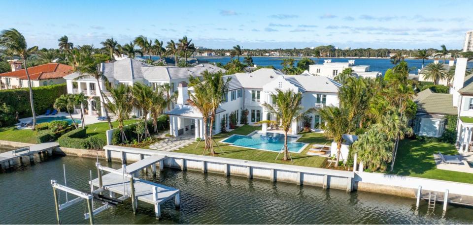 With a price just reduced to $34.5 million, a new house with a dock at 584 Island Drive on the east side of Everglades Island faces about 100 feet of frontage on the Intracoastal Waterway.