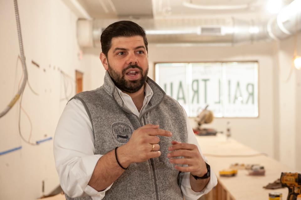 Michael Kasseris is one of three co-owners of Rail Trail Flatbread Co. in Hudson, April 26, 2023. A second restaurant opening is planned for this summer in downtown Milford.