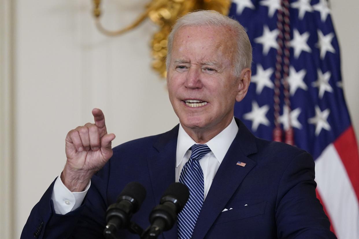 President Joe Biden speaks before signing the Democrats' landmark climate change and health care bill in the State Dining Room of the White House in Washington, Tuesday, Aug. 16, 2022.