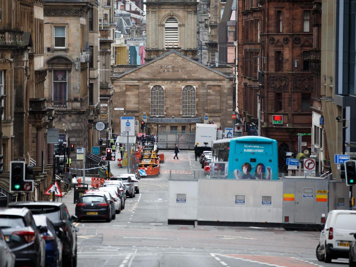 A police cordon was in place in the street outside the hotel: AFP