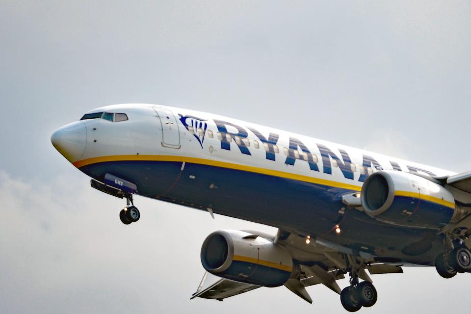 File photo dated 02/09/22 of a Ryanair Boeing 737-8AS passenger airliner comes in to land at Stansted Airport in Essex. Ryanair revealed sharply falling profits following a surge in fuel costs and cut its full-year profit outlook after being removed from some online travel agent websites. (PA Wire)