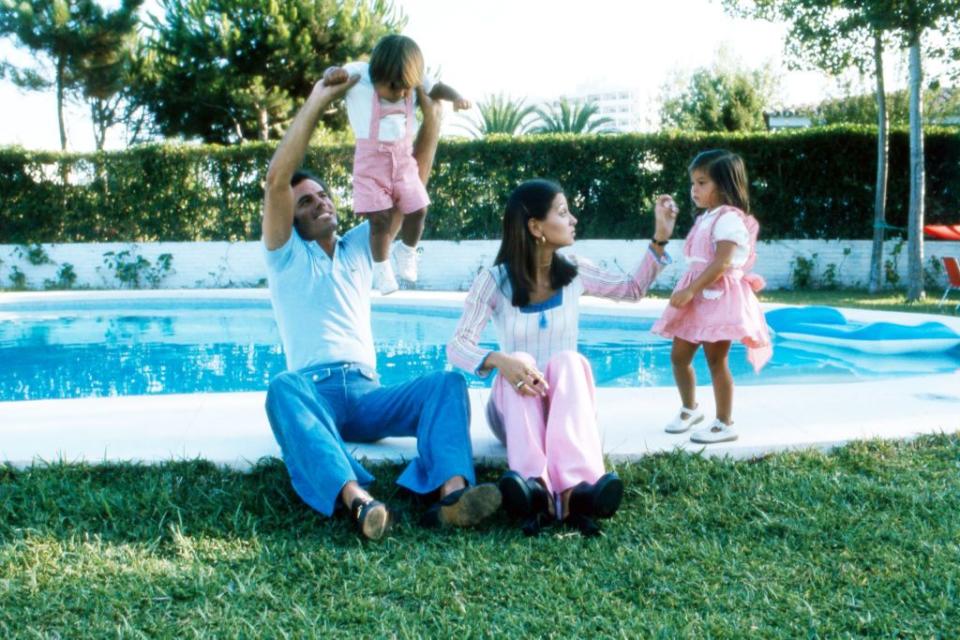 <p>The Spanish singer spends quality time with his young children, while he and his wife relax by the pool in the backyard of their home in Spain. </p>