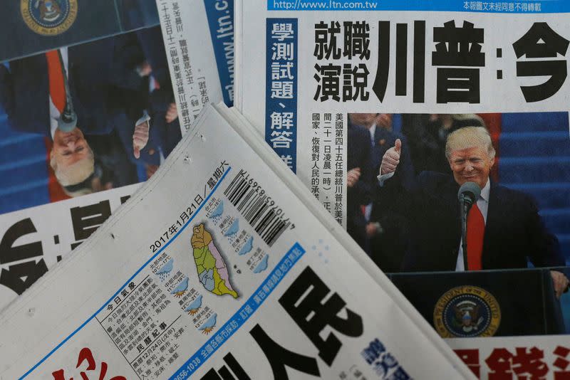 FILE PHOTO: Copies of Taiwanese daily newspaper Liberty Times, with its frontpage on the inauguration of U.S. President Donald Trump, are seen a printing house in Taipei, Taiwan