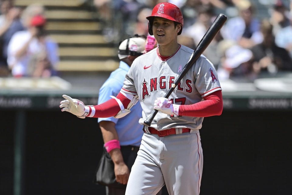 Los Angeles Angels' Shohei Ohtani reacts after striking out during the fourth inning of a baseball game against the Cleveland Guardians, Sunday, May 14, 2023, in Cleveland. (AP Photo/David Dermer)