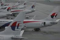 Malaysia Airlines has been declared "technically bankrupt" with the flag-carrier slashing 6,000 jobs as part of plans to recover from the loss of twin deadly disasters