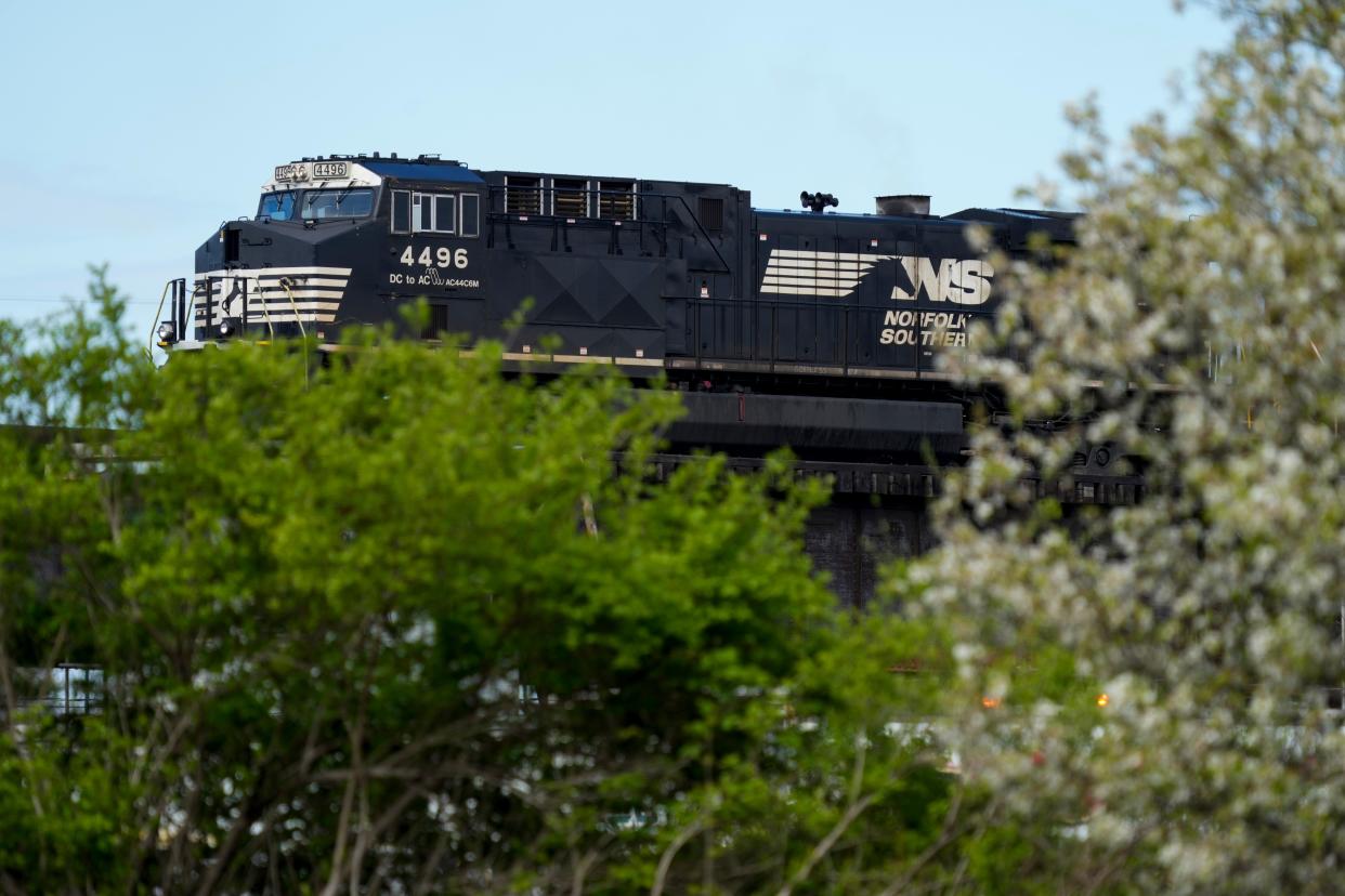 A Norfolk Southern train passes through the Queensgate neighborhood of Cincinnati on Monday, April 3, 2023.