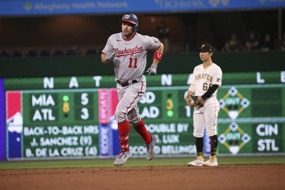 Washington Nationals' Ryan Zimmerman (11) runs the bases after hitting a home run in the eighth inning of a baseball game against the Pittsburgh Pirates, Saturday, Sept. 11, 2021, in Pittsburgh. (AP Photo/Rebecca Droke)