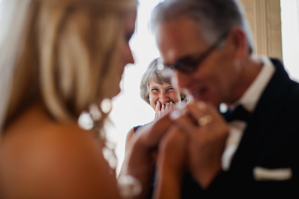 "The bride, Kelsey, planned a special moment for her dad to see her for the first time on her wedding day. While I photographed the two of them, her mom tried to stay out of my way. But when I saw her excitement, I knew I had to capture it." - Laura Zastrow