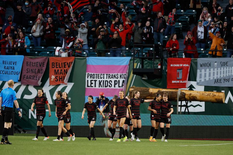 Portland Thorns FC players celebrate after a goal scored against the Washington Spirit at Providence Park.