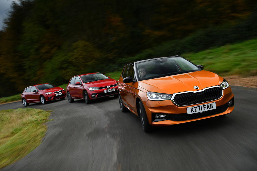 The Skoda Fabia leads the Volkswagen Polo and Seat Ibiza through a corner