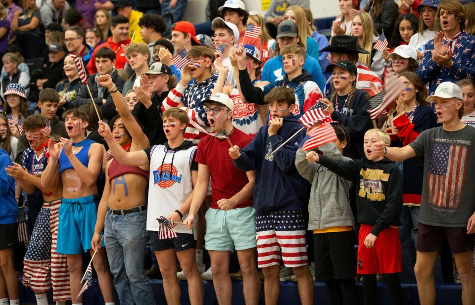 Cascade fans cheer on the team during their match against Marshfield in the 4A volleyball state championships in Springfield.