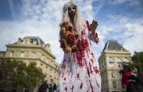 <p>Participants in costume walk in World Zombie Day 2017 event on Place de la République in Paris, France, Oct. 7, 2017. (Photo: EFE/EPA/IAN LANGSDON) </p>
