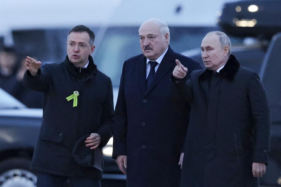 Russian President Vladimir Putin, right, and Belarusian President Alexander Lukashenko, center, accompanied by Russian presidential aide Vladimir Medinsky, arrive to attend the opening ceremony opening of the memorial complex "To the peaceful citizens of the Soviet Union who died during the Great Patriotic War", WWII, near Zaitsevo village in the Leningrad Region, Russia, Saturday, Jan. 27, 2024. The ceremony marked the 80th anniversary of the battle that lifted the Siege of Leningrad. The Nazi siege of Leningrad, now named St. Petersburg, was fully lifted by the Red Army on Jan. 27, 1944. More than 1 million people died mainly from starvation during the nearly 900-day siege. (Anton Vaganov/Pool Photo via AP)