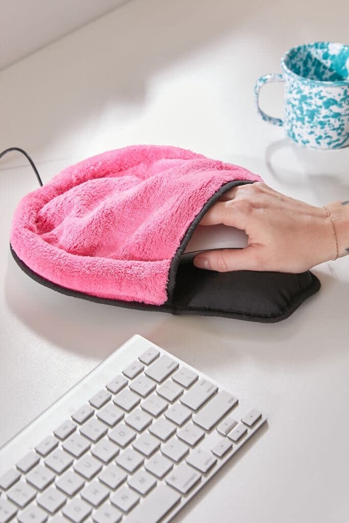 If you're stuck at a computer all day, <a href="https://fave.co/2ITJv8T" target="_blank" rel="noopener noreferrer">this heated mouse pad</a> might be just what you need to get through your inbox. You can take turns warming up your hands with this heating pad, which features a cushioned rest and fuzzy outside. It's powered by a USB cord. <a href="https://fave.co/2ITJv8T" target="_blank" rel="noopener noreferrer">Find it for $20 at Urban Outfitters</a>.