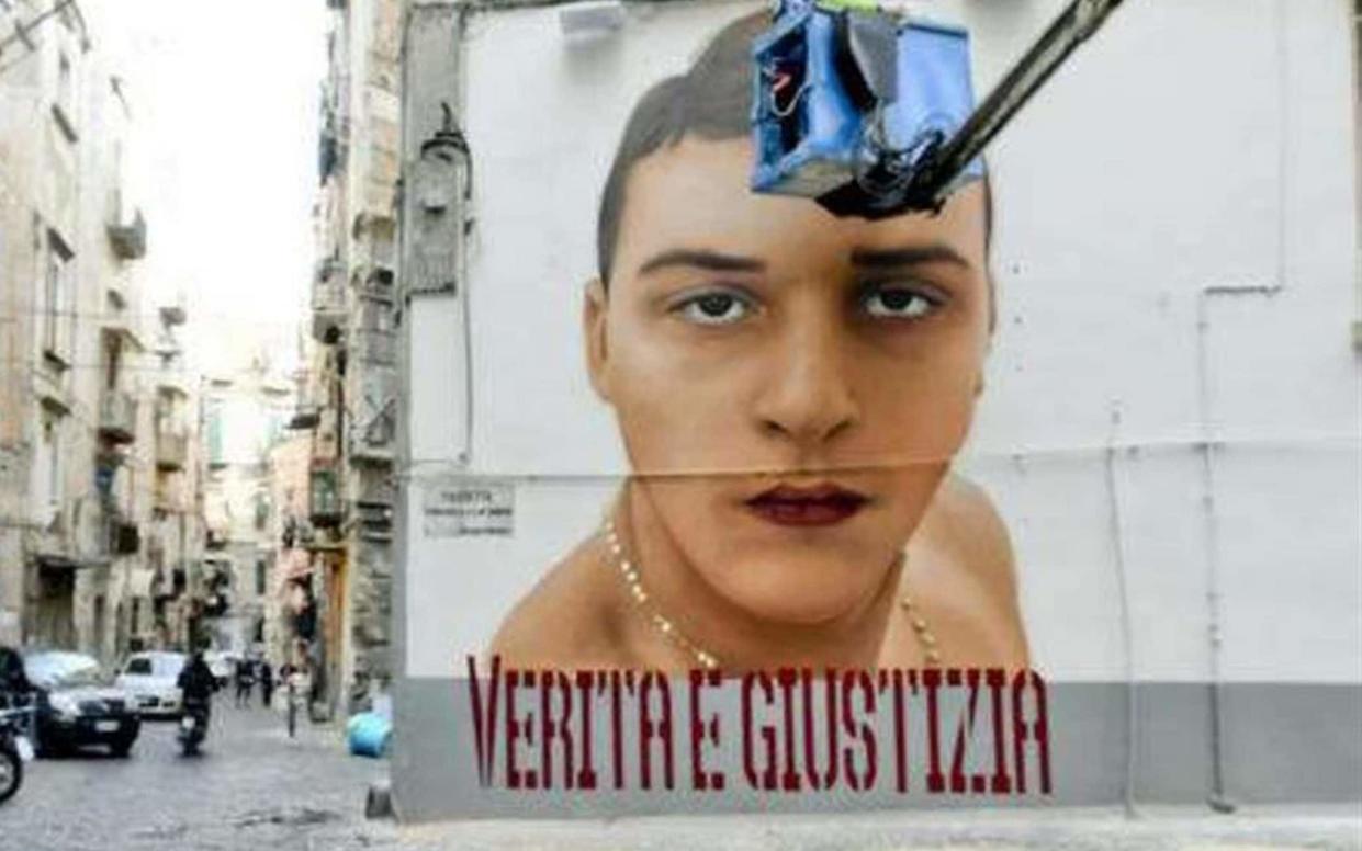A mural in tribute to Ugo Russo, who was killed during a robbery in Naples, with the words Verità e Giustizia – Truth and Justice