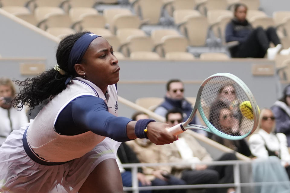 Coco Gauff of the U.S. plays a shot against Ukraine's Dayana Yastremska during their third round match of the French Open tennis tournament at the Roland Garros stadium in Paris, Friday, May 31, 2024. (AP Photo/Christophe Ena)