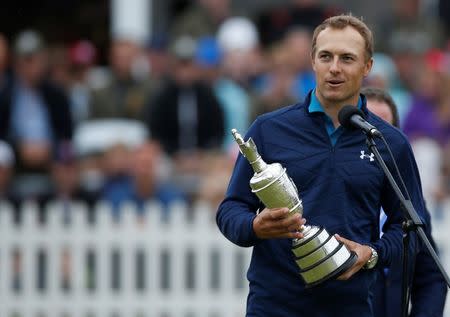 USA’s Jordan Spieth celebrates with The Claret Jug after winning The Open Championship REUTERS/Paul Childs