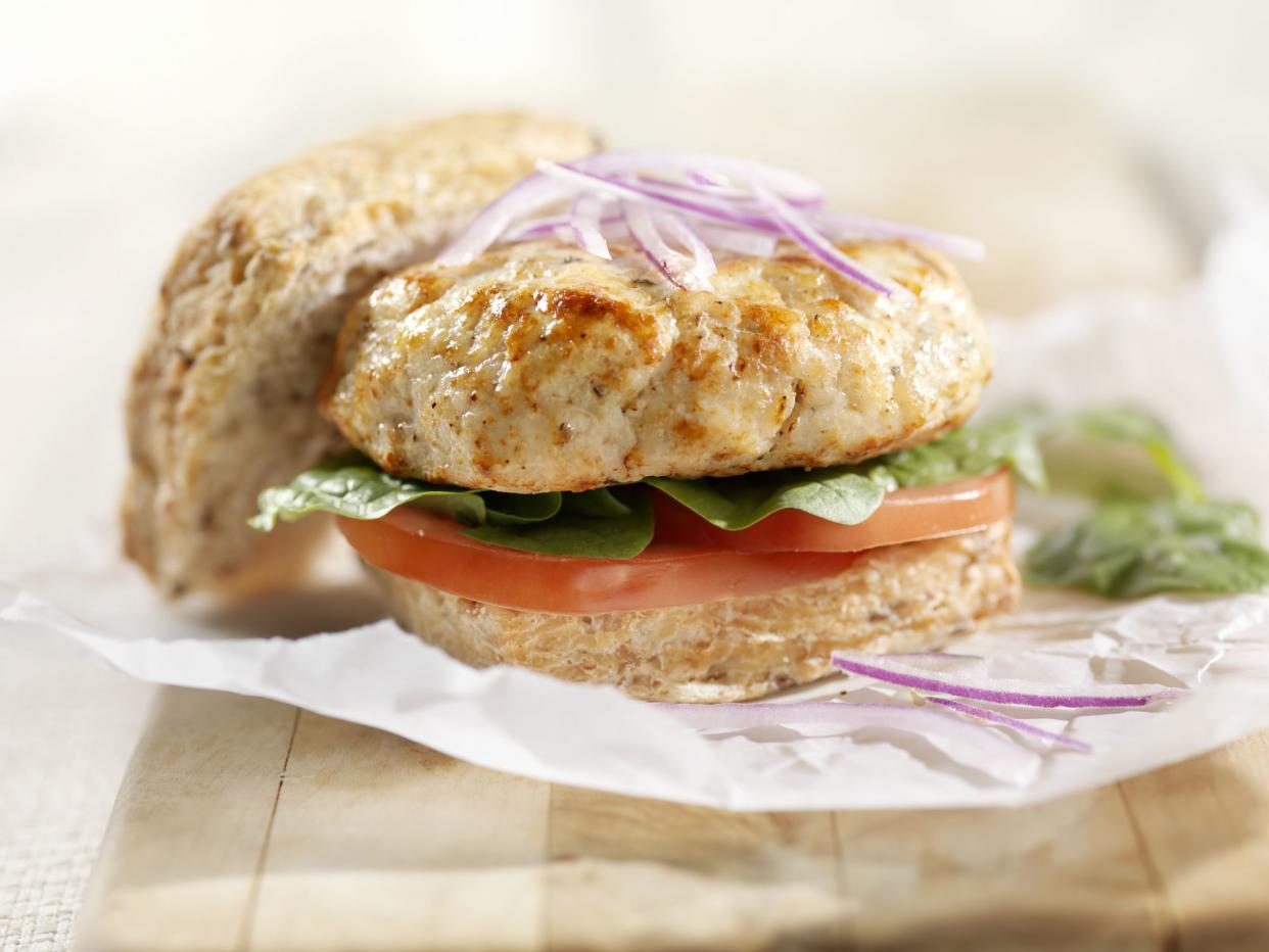 Ground Turkey Burger with Lettuce and Tomato on a Ciabatta Bun -Photographed on Hasselblad H3D2-39mb Camera