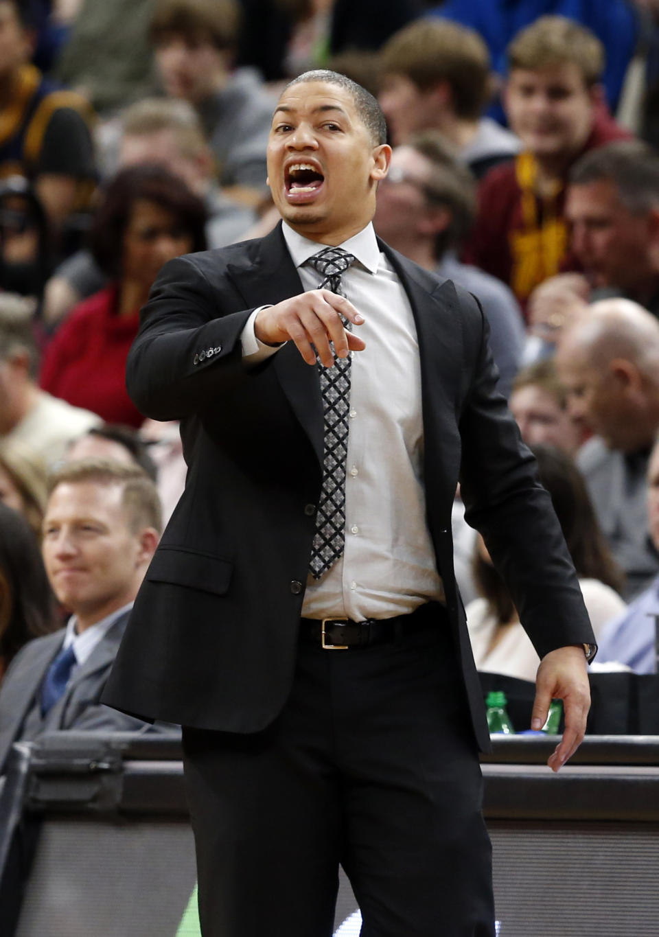 Cleveland Cavaliers head coach Tyronn Lue yells instructions to his team during the second half of an NBA basketball game against the Minnesota Timberwolves, Tuesday, Feb. 14, 2017, in Minneapolis. The Cavaliers won 116-108. (AP Photo/Jim Mone)