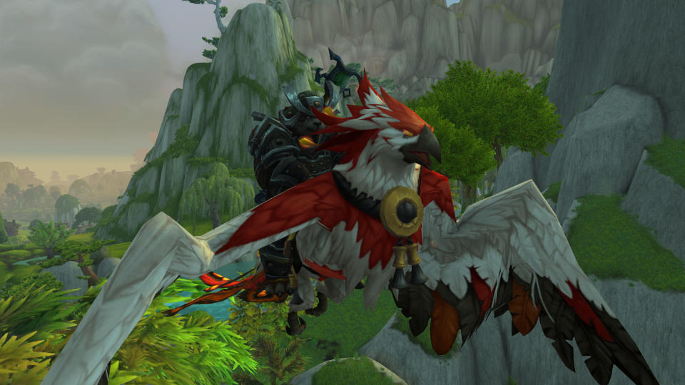 Pandaren riding a phoenix