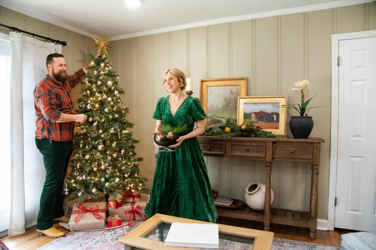 HGTV Ben and Erin Napier stage the Christmas decor in preparation for the big reveal during their recent special, Home Town Holidays. (HGTV) 