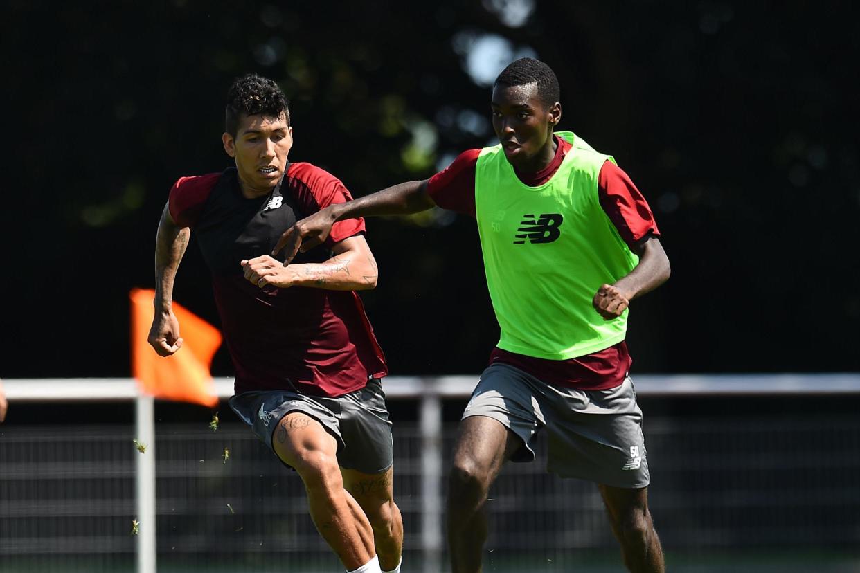 Learning curve | Rafael Camacho takes on Roberto Firmino in training: Andrew Powell/Liverpool FC via Getty Images