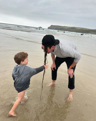 <p>Princess Eugenie/Instagram</p> (From left) August Brooksbank and Jack Brooksbank play on the beach in a photo Princess Eugenie posted on May 3, 2024.