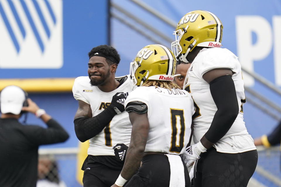 Alabama State wide receiver Jeremiah Hixon (1) celebrates after scoring a touchdown during the first half of an NCAA college football game against UCLA in Pasadena, Calif., Saturday, Sept. 10, 2022. (AP Photo/Ashley Landis)