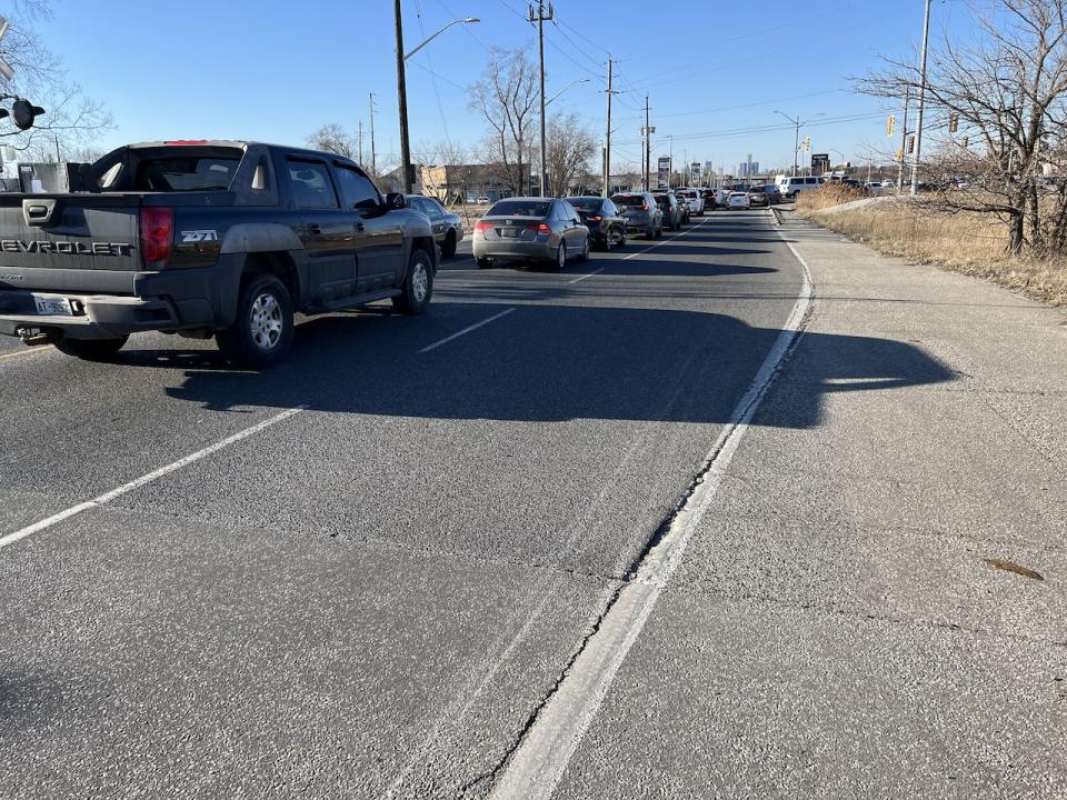 Northbound traffic on Howard Avenue in Windsor is shown backed up waiting for the light to change near the Devonshire Mall.