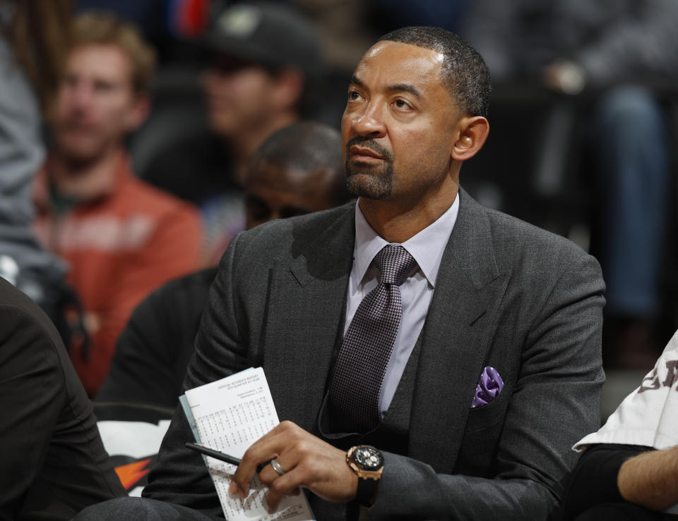 FILE - In this Nov. 30, 2016, file photo, Miami Heat assistant coach Juwan Howard watches during the second half of the team's NBA basketball game against the Denver Nuggets in Denver. A person with knowledge of the situation tells The Associated Press that Howard has agreed to a five-year deal to take over as Michigan men's basketball coach. The person spoke on condition of anonymity Wednesday, May 22, 2019, because the announcement had not been made. (AP Photo/David Zalubowski, File)