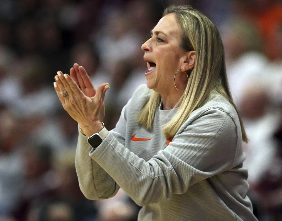 Clemson head coach Amanda Butler shouts out to players in the first half of an NCAA college basketball game against Virginia Tech in Blacksburg, Va, Sunday, Jan. 21, 2024. (Matt Gentry/The Roanoke Times via AP)