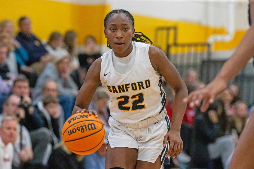 Sanford senior Tyler Edwards (22) drives the ball against Ursuline Academy during the girls basketball game at Sanford gym in Hockessin, Thursday, Feb. 15, 2024. Sanford won 81-76 in overtime.