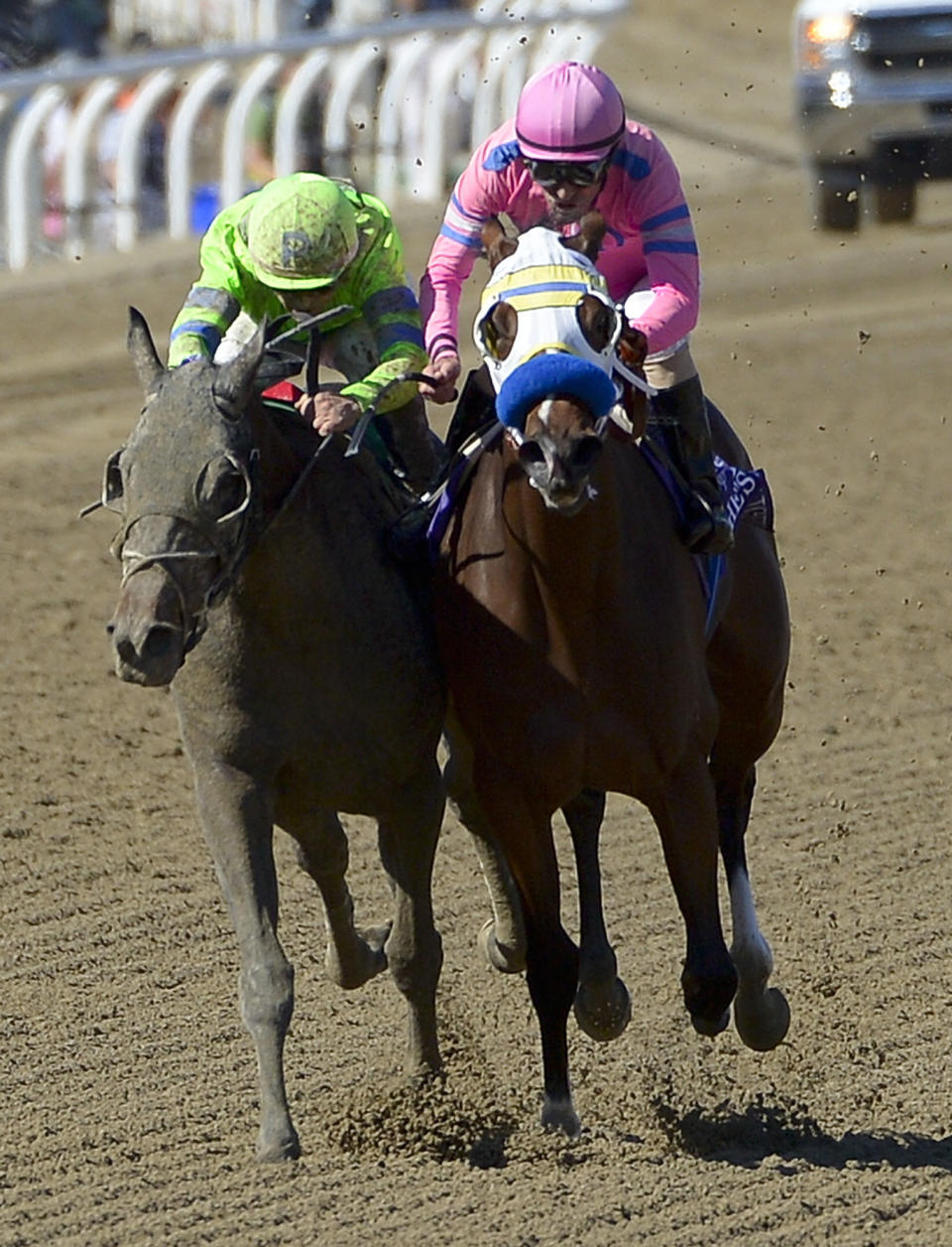 File- This Nov. 2, 2013, file photo shows Ria Antonia, left, with jockey Javier Castellano aboard winning the Breeders' Cup Juvenile Fillies horse race at Santa Anita Park in Arcadia, Calif. A filly is going to challenge the boys in the Preakness for the first time since 2009 when Rachel Alexandra won. Ria Antonia will be ridden by Calvin Borel, who guided Rachel Alexandra to victory. Ria Antonia is coming off a sixth-place finish in the Kentucky Oaks on May 2 at Churchill Downs, where she has been training. (AP Photo/Mark J. Terrill, File)