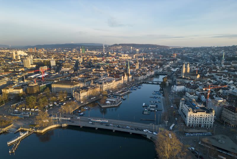 FILE PHOTO: The Limmat river and the city are seen early morning in Zurich