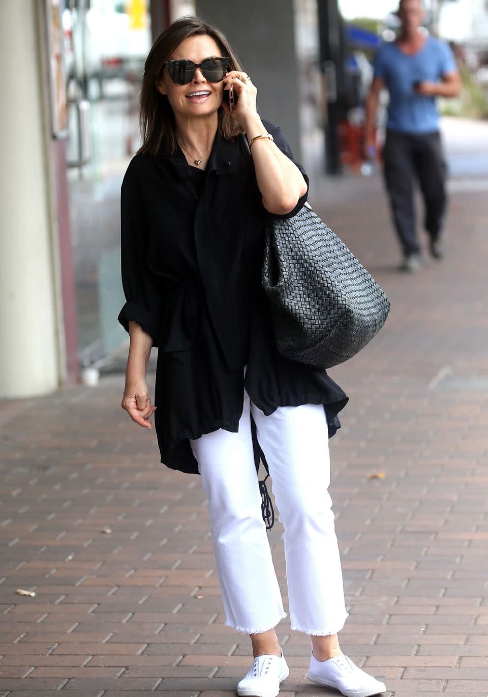 She sported a black blouse teamed with a pair of white trousers. Source: Diimex