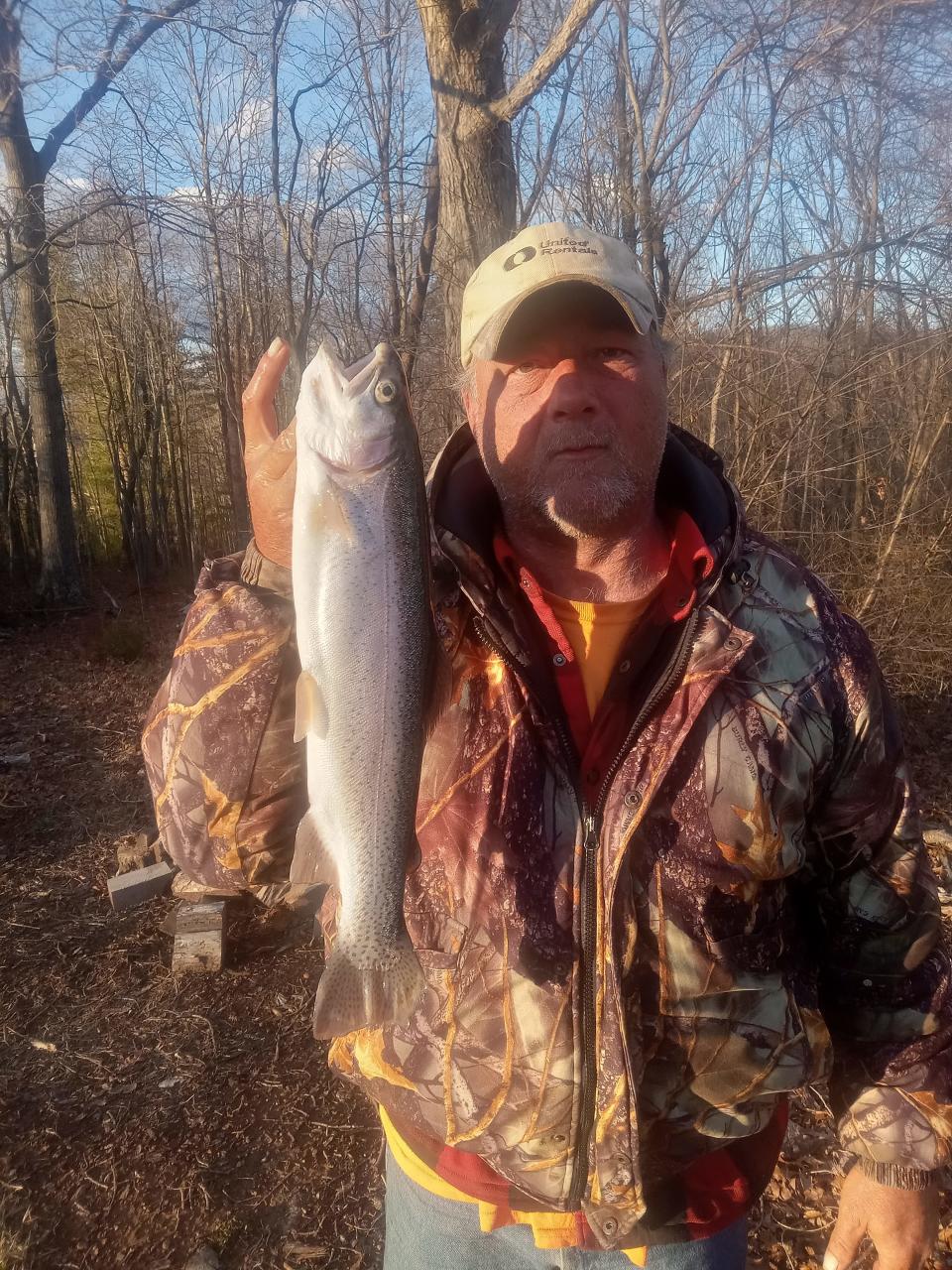 Mark Beckner shows off his Rainbow Trout. (Photo Courtesy: Mark Beckner)