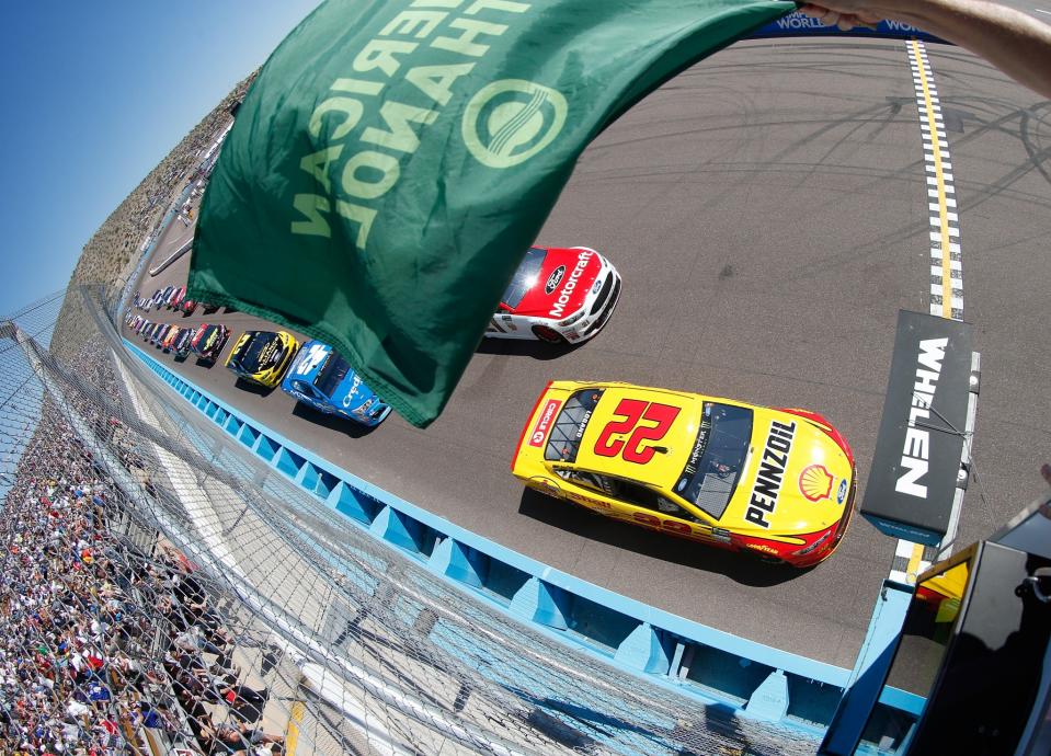 <p>oey Logano, driver of the #22 Shell Pennzoil Ford, taks the green flag to start the Monster Energy NASCAR Cup Series Camping World 500 at Phoenix International Raceway in Avondale, Arizona. </p>