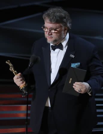 90th Academy Awards - Oscars Show - Hollywood, California, U.S., 04/03/2018 - Guillermo del Toro accepts the Oscar for Best Director for "The Shape of Water." REUTERS/Lucas Jackson