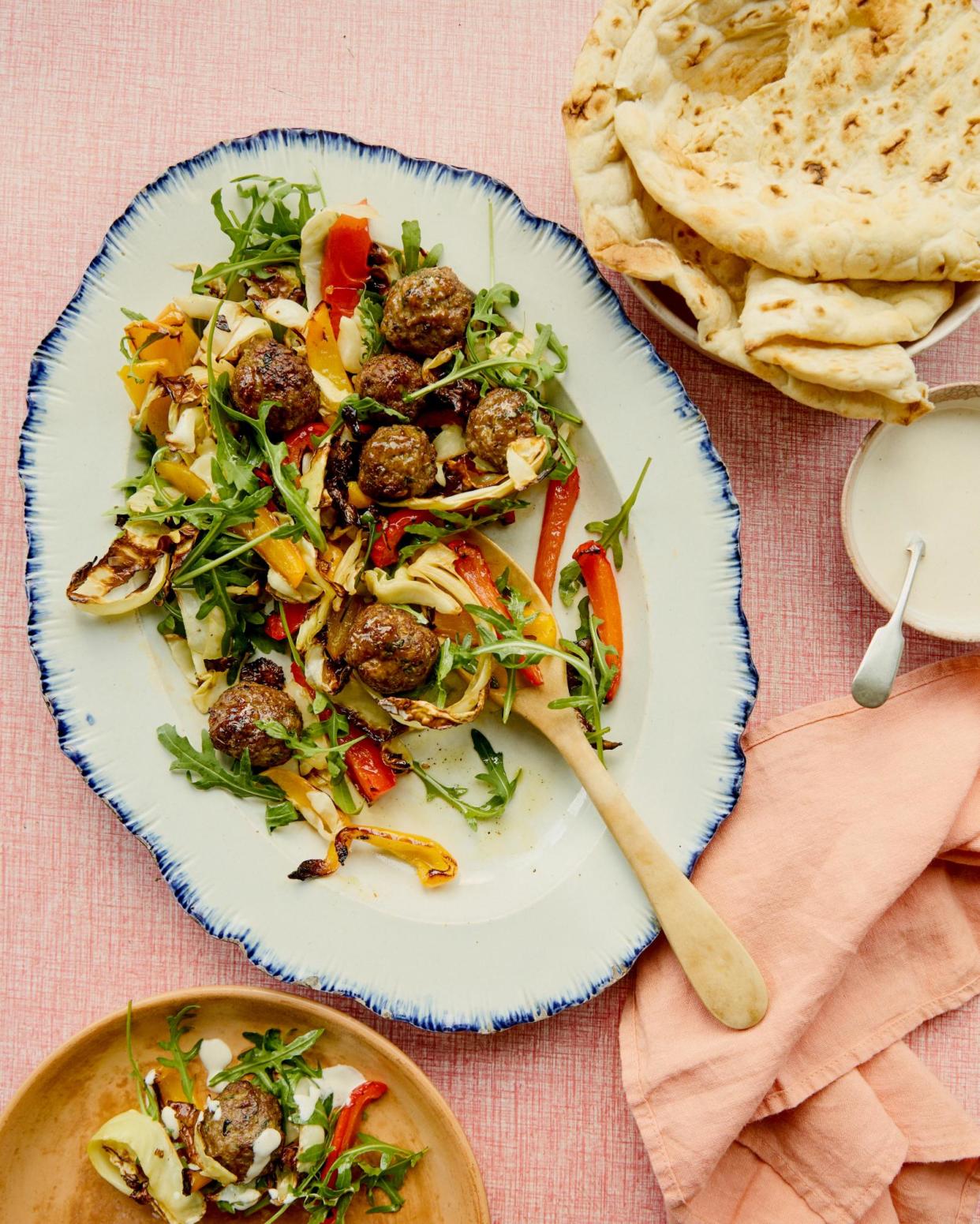 <span>Honey & Co’s air fryer lamb koftas with peppers, cabbage and tahini sauce.</span><span>Photograph: Kim Lightbody/The Guardian. Food styling: Hanna Miller. Prop styling: Louie Waller. Food styling assistant: Alice Earll.</span>