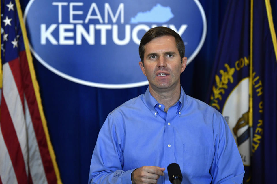 FILE - In this Sept. 23, 2020, file photo, Kentucky Gov. Andy Beshear speaks at the Kentucky State Capitol in Frankfort, Ky. While Senate leader Mitch McConnell is at the center of talks on another coronavirus relief bill, hardships are mounting in his home state of Kentucky. (AP Photo/Timothy D. Easley)