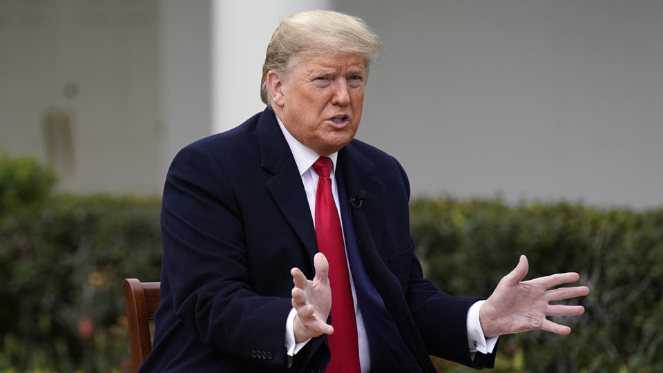 President Trump speaks with Fox News Channel Anchor Bill Hemmer during a Fox News Channel virtual town hall on Tuesday. (Evan Vucci/AP)