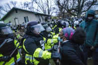 Protesters confronted police over the shooting death of Daunte Wright at a rally at the Brooklyn Center Police Department in Brooklyn Center, Minn., Monday, April 12, 20121. (Richard Tsong-Taatarii/Star Tribune via AP)