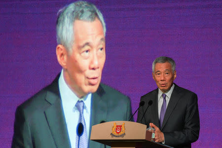 Singapore's Prime Minister Lee Hsien Loong speaks at the ASEAN Business and Investment Summit in Singapore, November 12, 2018. REUTERS/Athit Perawongmetha