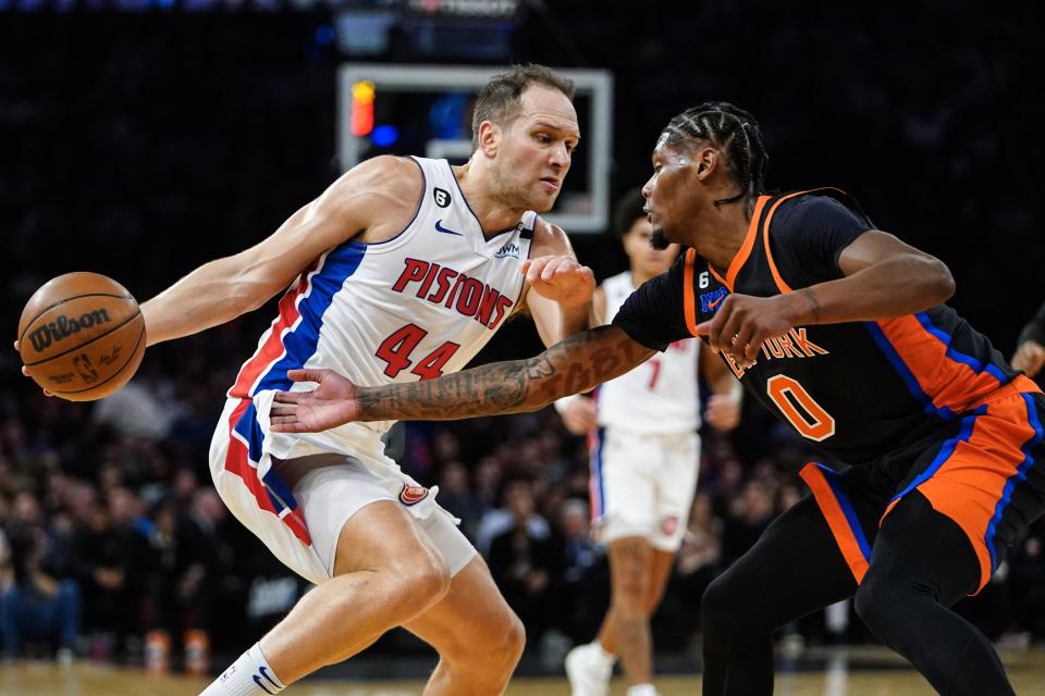 Knicks guard Cam Reddish defends against Pistons forward Bojan Bogdanovic during the first half on Friday, Nov. 11, 2022, at Madison Square Garden.