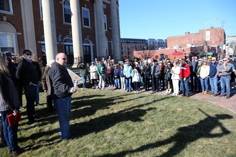 Dover Mayor Bob Carrier speaks to family and friends of late Capt. Jack Casey during a flag ceremony outside City Hall Saturday, Feb. 10, 2024.