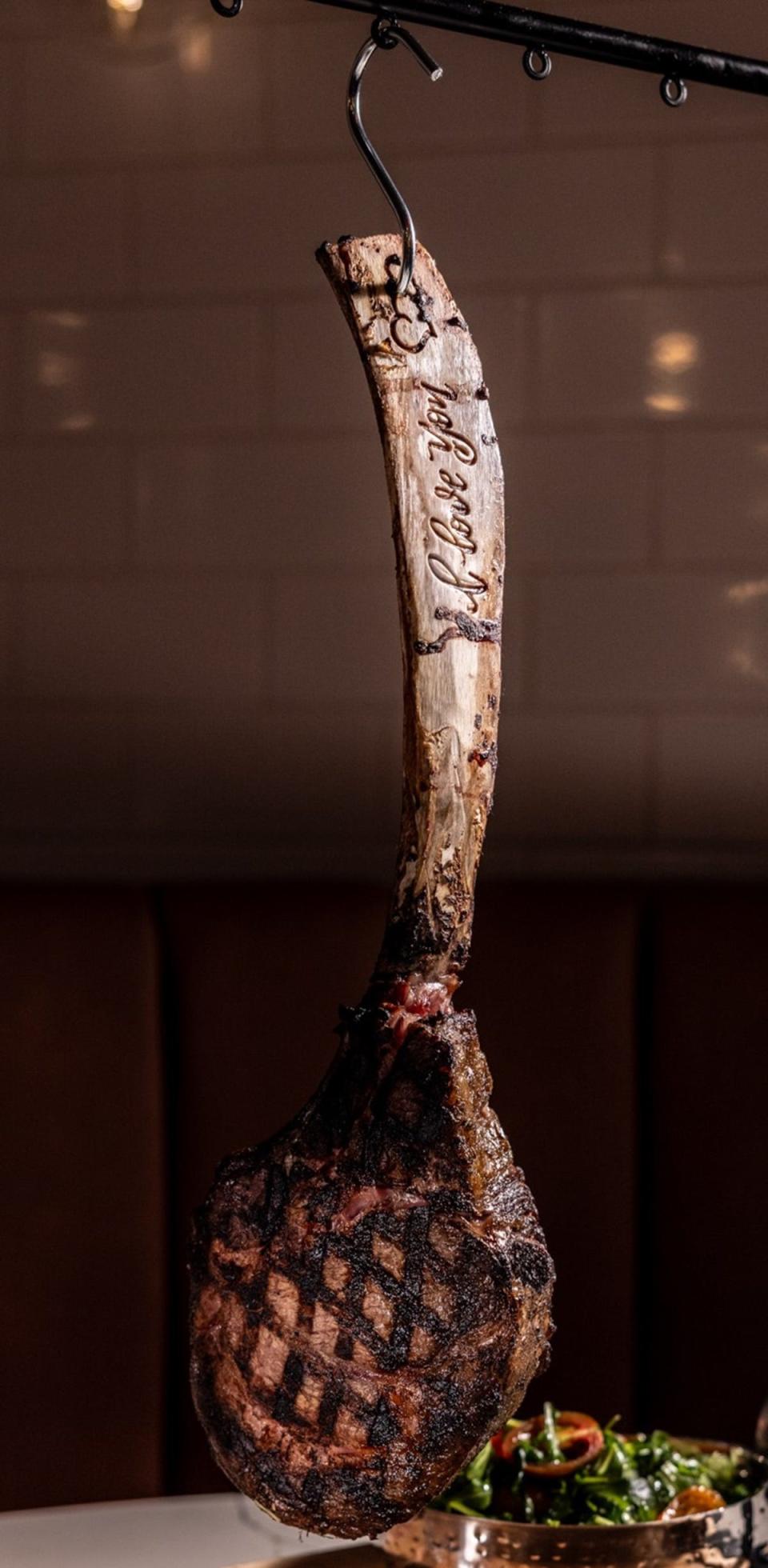 Red Horse by David Burke in White Plains is offering a 40-ounce tomahawk steak for two hanging from a hook with its long, exposed bone engraved with “I Love You” as part of its Valentine's Day specials.