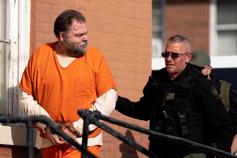 George &quot;Billy&quot; Wagner III is led into the Pike County Common Pleas Courthouse by officers of the Ohio Department of Rehabilitation and Correction for his first pre-trial hearing in nearly a year. He has been held at the Butler County Jail since he was arrested with other Wagner family members in November 2018.