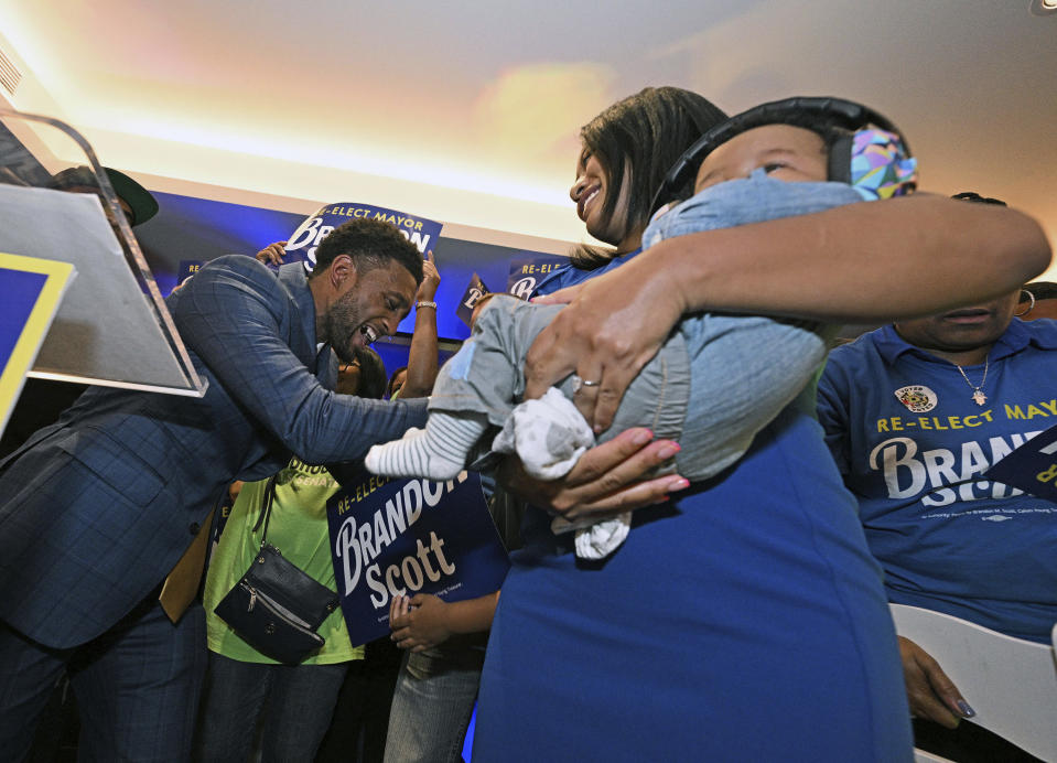 Baltimore Mayor Brandon Scott celebrates with supporters while declaring victory during a Democratic primary election night watch party, Tuesday, May 14, 2024, in Port Covington, Md. (Kenneth K. Lam/The Baltimore Sun via AP)