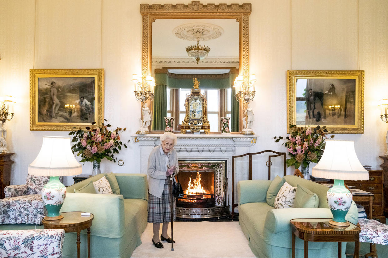 Britain's Queen Elizabeth II waits in the Drawing Room before receiving Liz Truss for an audience at Balmoral, where Truss was be invited to become Prime Minister and form a new government, in Aberdeenshire, Scotland, on Sept. 6, 2022. (Jane Barlow / WPA via AP)