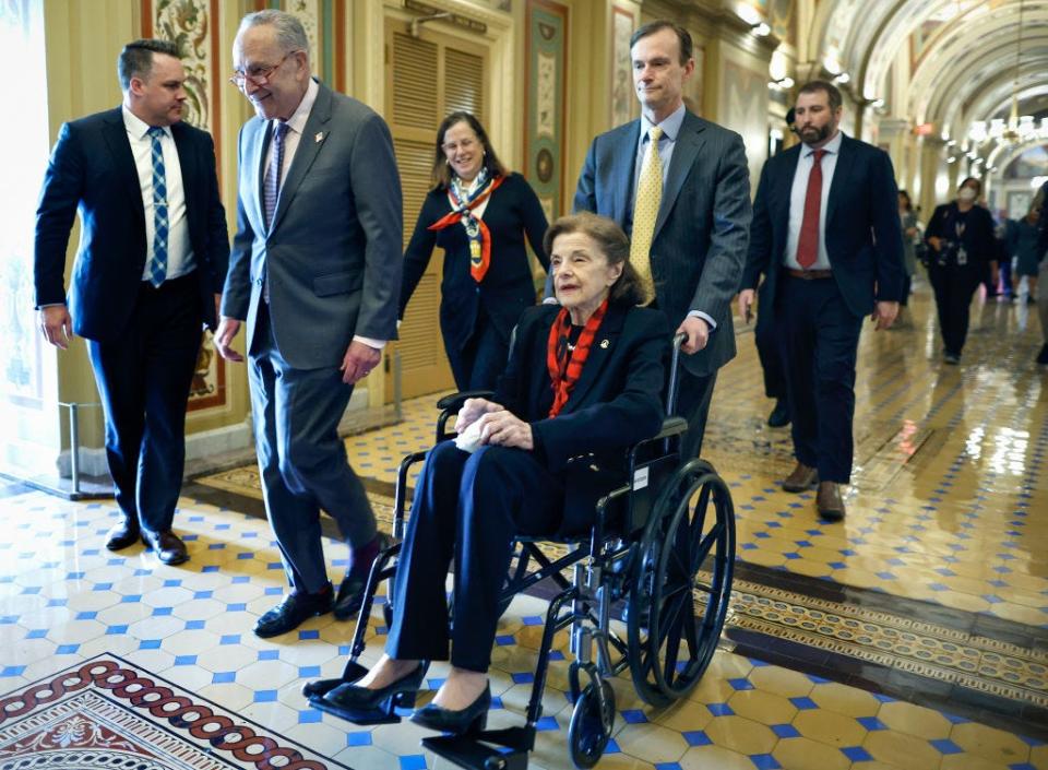 Dianne Feinstein in a wheelchair on Capitol Hill